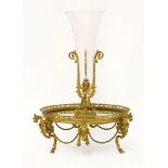 A French gilt and mirrored centrepiece,late 19th century, centred with an etched glass trumpet vase,