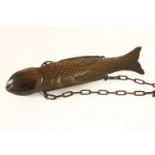 A Japanese carved wooden fish kettle hook,with chain, used in the tea ceremony,44cm long