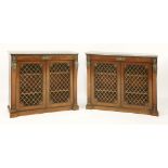 Two Regency mahogany and gilt bronze mounted side cabinets,each with grey marble tops, with