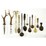 A collection of ivory and treen spoons and ladles,18th century and later, including: a ladle with