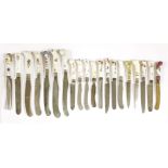 Twenty porcelain Continental and English handled knives,mainly 18th century, fourteen with pistol
