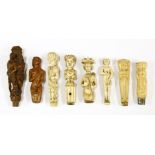 Six ivory cutlery handles,17th century and later, carved with figures, andtwo boxwood handles,one