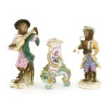 Two Meissen monkey band figures, late 19th century, incised '16' and '18', both stamped '83', and