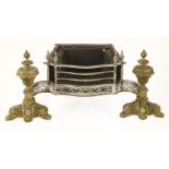 A steel and brass fire basket,in the George III style, the serpentine grate flanked by crisply and