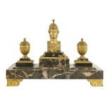 An Empire bronze inkstand, with a pair of urn inkwells and a classical bust on a marble base,45cm