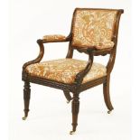 A Regency period rosewood armchair, with carved bosses and legs, 56cm wide74cm deep89cm high