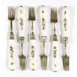 A set of six silver and Continental porcelain forks,the silver blades by RP, London 1818, the