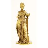 After Eutrope Bouret (1833-1906), a gilt bronze figure of a maiden painting a vase, 38cm high