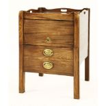 A George III mahogany night commode,the tray top over an up-and-over door and a drawer, now