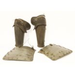 A pair of armour elbow and forearm pieces, and a pair of articulated tassets (4)