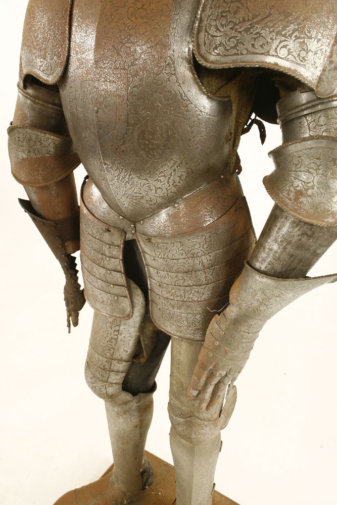 An engraved suit of armour,late 19th/early20th century, on a wooden stand,170cm high overall - Image 4 of 5