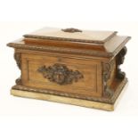 A Victorian mahogany cellaret,the shaped hinged top enclosing twelve baize-lined compartments, the