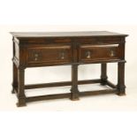 A Continental oak and mahogany dresser base,19th century, with three frieze drawers over a pot