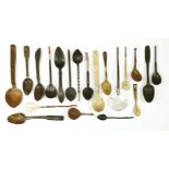 A collection of treen, bone and horn spoons,17th century and later, including two coral mounted