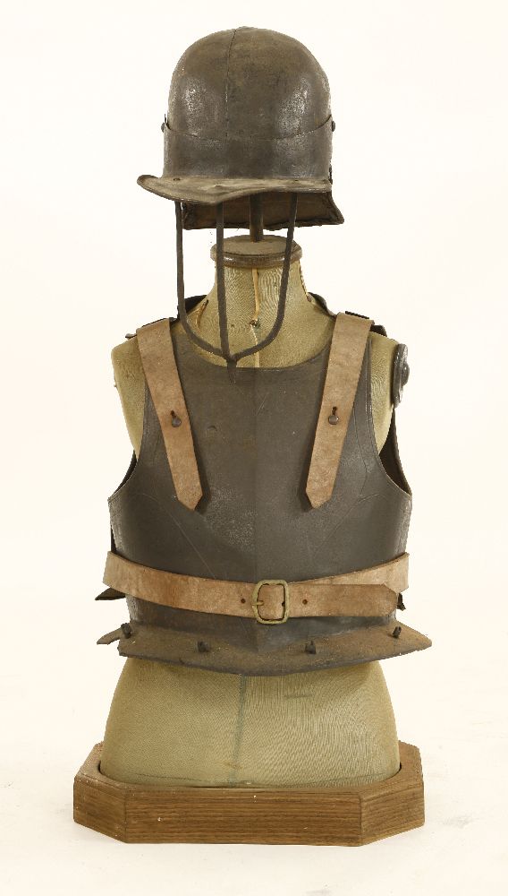 Cromwellian armour,a lobster tail helmet, breast and backplates, on a half dummy (4)