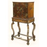 A William and Mary collector's cabinet on stand,of oyster veneered laburnum wood, with floral