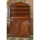 A William IV mahogany chiffonier,with a shaped, moulded, leaf-carved and scrolled pediment, above