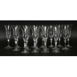 A set of eighteen modern champagne flutes, 24cm high (18)