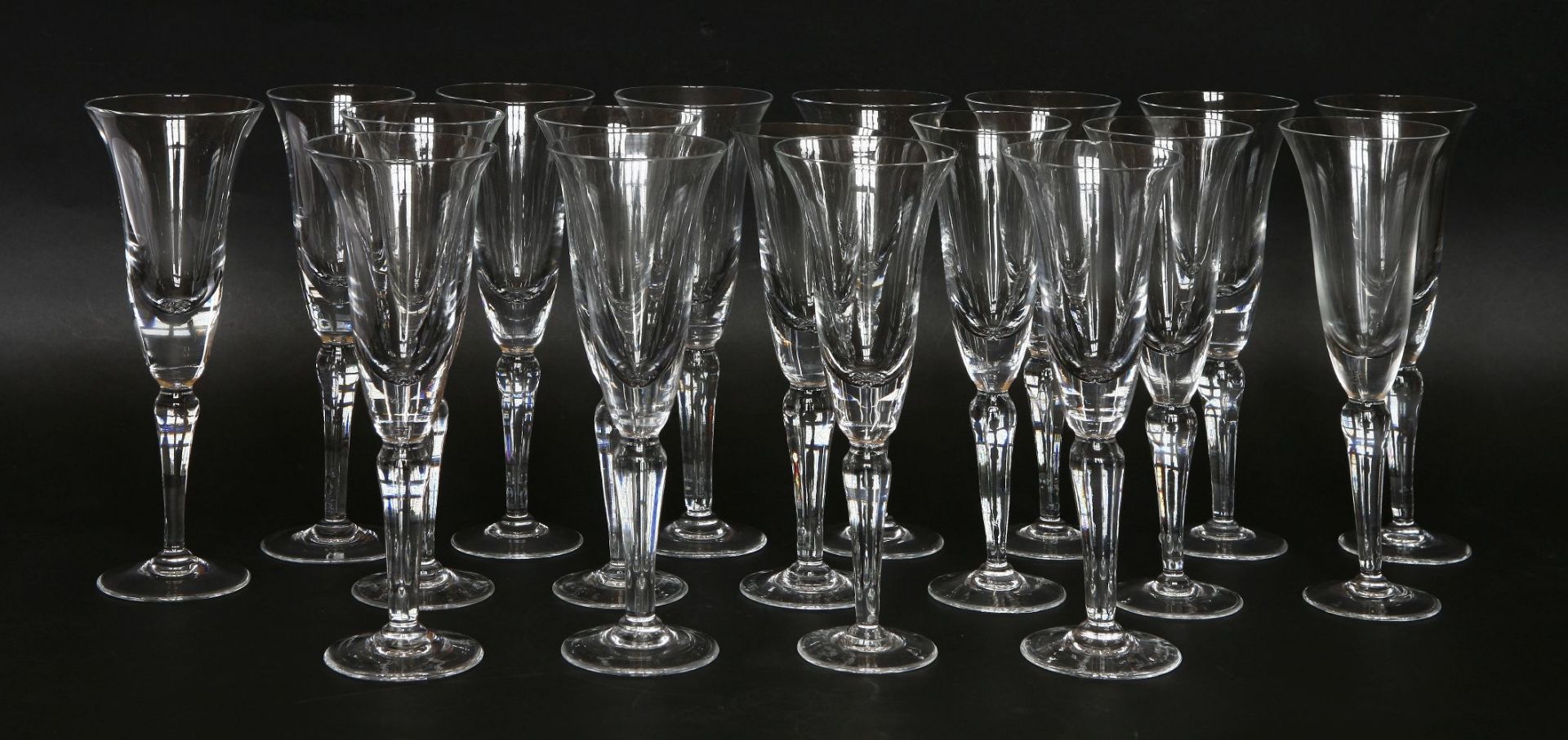 A matched set of eighteen modern champagne flutes, 24cm high (18)