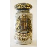 A large glass apothecary's display jar and cover,decorated with the royal United Kingdom coat of