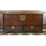 A Portuguese colonial mahogany and ebonised banded chest,early 19th century, the rising lid