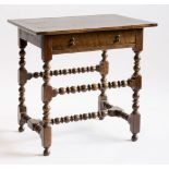 An oak side table,in the 17th century style, the rectangular top with cleated ends, above a single