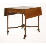 A satinwood and mahogany Pembroke table,the strung and crossbanded satinwood drop-leaf top over a