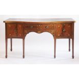 A George III mahogany serpentine front sideboard,the top with broad, probably zebra wood,