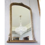 A giltwood overmantel mirror,in the 19th century style, with a ribbon finial above a decorative leaf