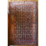 A Bidjar carpet, North-West Persia, c.1910, the indigo field with an overall vinery trellis,