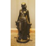 A plaster, bronze-effect, painted bust,20th century, of a scantily-clad maiden standing in a typical