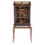 A Continental ebony and red tortoiseshell glazed display cabinet,18th century, having a cast metal