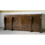 A Regency rosewood cabinet,having a later grey veined marble top over a plain frieze with a beaded