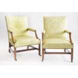 A pair of George III mahogany Gainsborough or library chairs,upholstered in gold damask, the