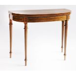 A George III mahogany strung and crossbanded demi-lune card table,the fold-over top on turned and