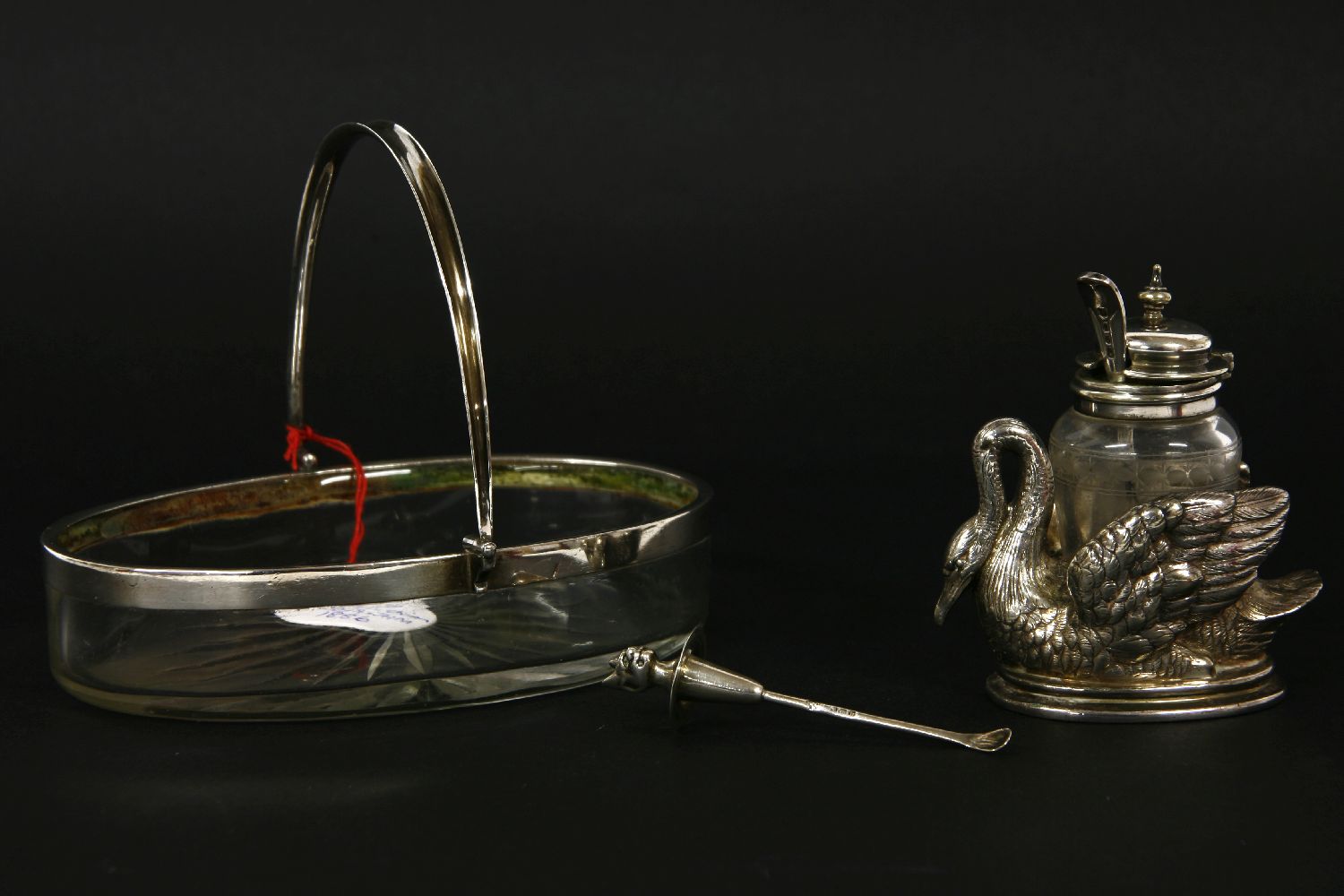 An Elkington EPNS mustard pot, in the form of a swan, together with a silver and cut glass butter