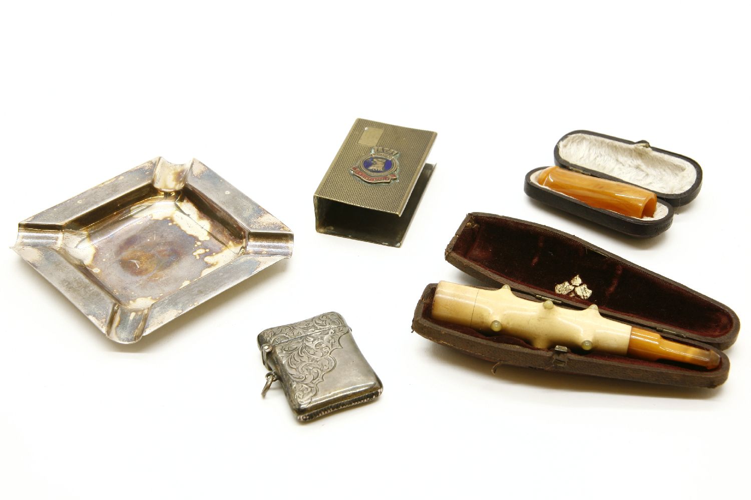 A Birmingham 1911 silver vesta case, Meerschaum cigar/cheroot holder, silver ashtray by Sanders &