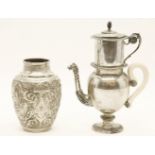 A 19th century, possibly Middle Eastern white metal coffee pot, the spout terminating in a camels
