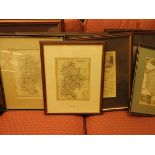 A collection of antique maps, mostly framed