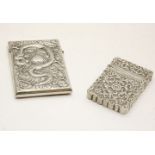 A Chinese silver card case, embossed with a dragon one side, bamboo the other, 10.5cm high, and an