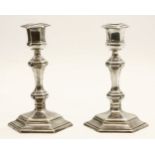 A pair of Georgian style silver candlesticks, London, 1893-94