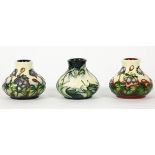 Three Moorcroft miniature vases, 1999, 2000 trial and 2002, each 5.5cm high