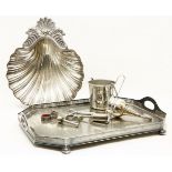 A large silver plated wine funnel, 19cm long, together with other silver plated items to a include a