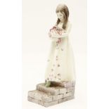 A Royal Worcester F G Doughty porcelain figure, 'The Bridesmaid', No. 3224, 21.5cm high