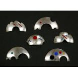 Six assorted silver brooches, signed P Malysz, to include six silver crescent shaped examples with