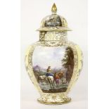 A large yellow ground Helena Wolfsohn style porcelain jar and cover, painted with figures loading an