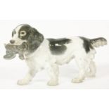 A Bing & Grondahl spaniel, with a partridge in its mouth, 24.5cm