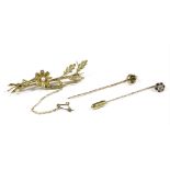 A 9ct gold split pearl floral spray bar brooch (pin not gold), a gold single stone sapphire stick