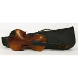 An early 20th century violin, of caramel brown colour with a figured two piece back, length of