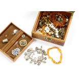 A collection of jewellery to include a curb link charm bracelet, with silver padlock, with a